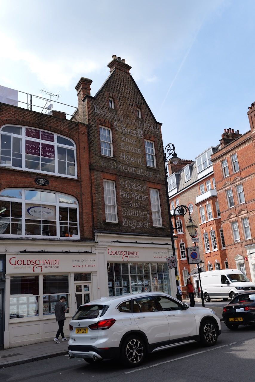 Ghost signage on a building, established in 1746.