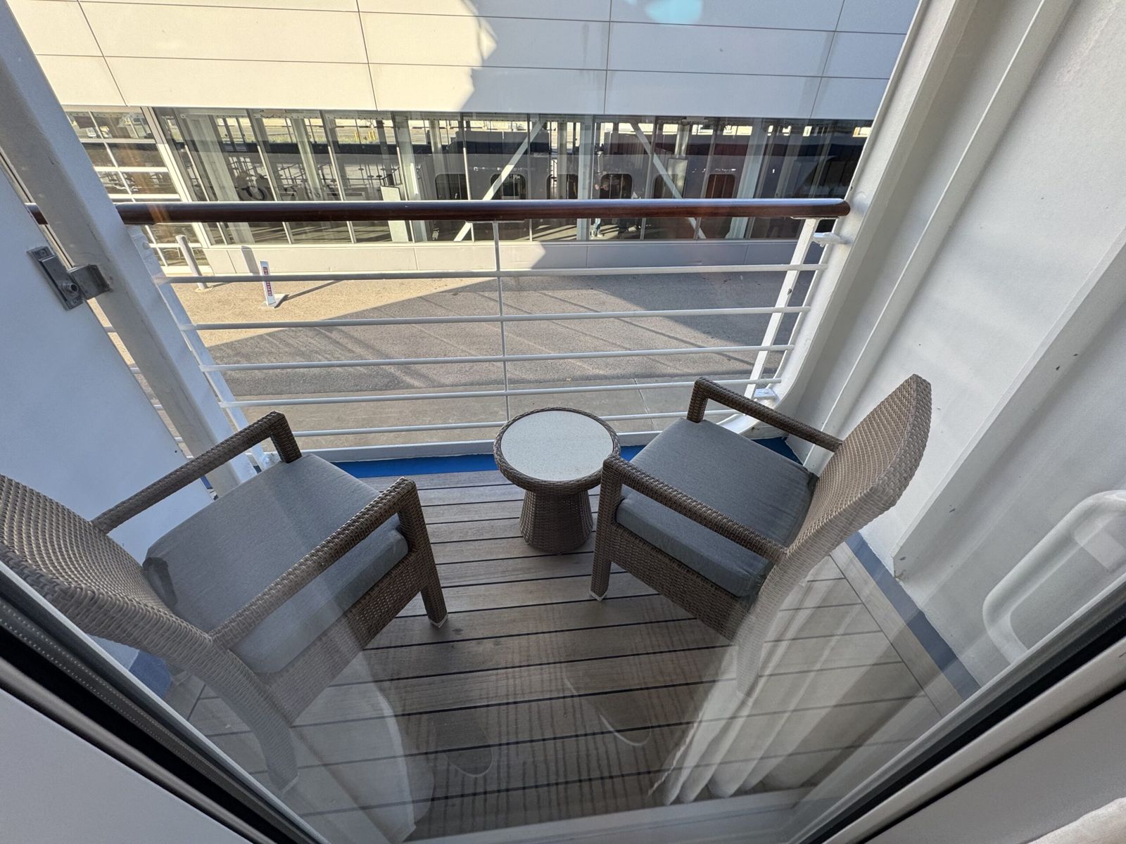 Our balcony up close. The blue chairs, table and railing 