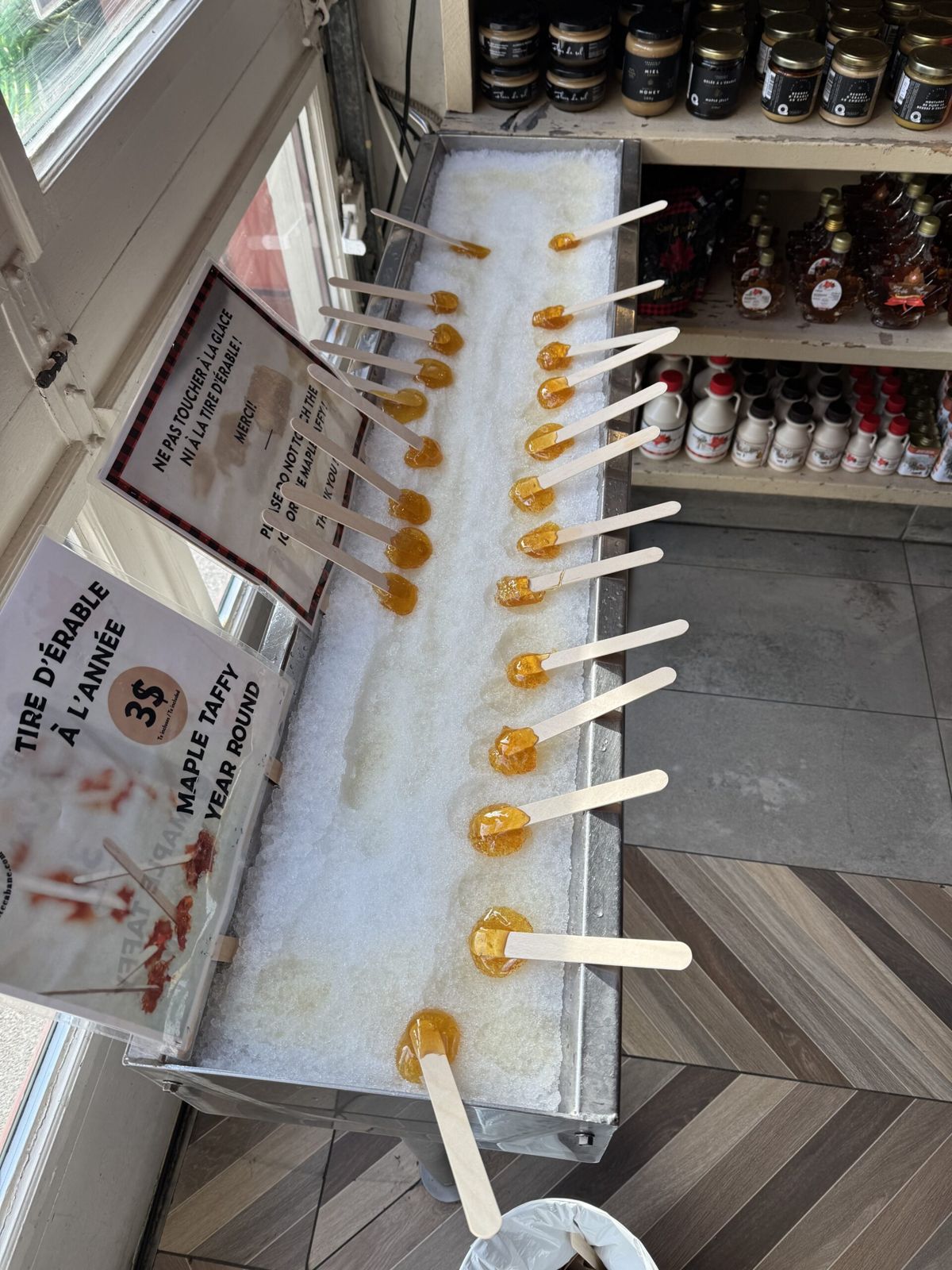 Maple taffe. It sits in little blobs on snow to harden in. There are 20 or so in a long rectangular serving dish. The taffe is on paddle pop sticks. It was yum!  