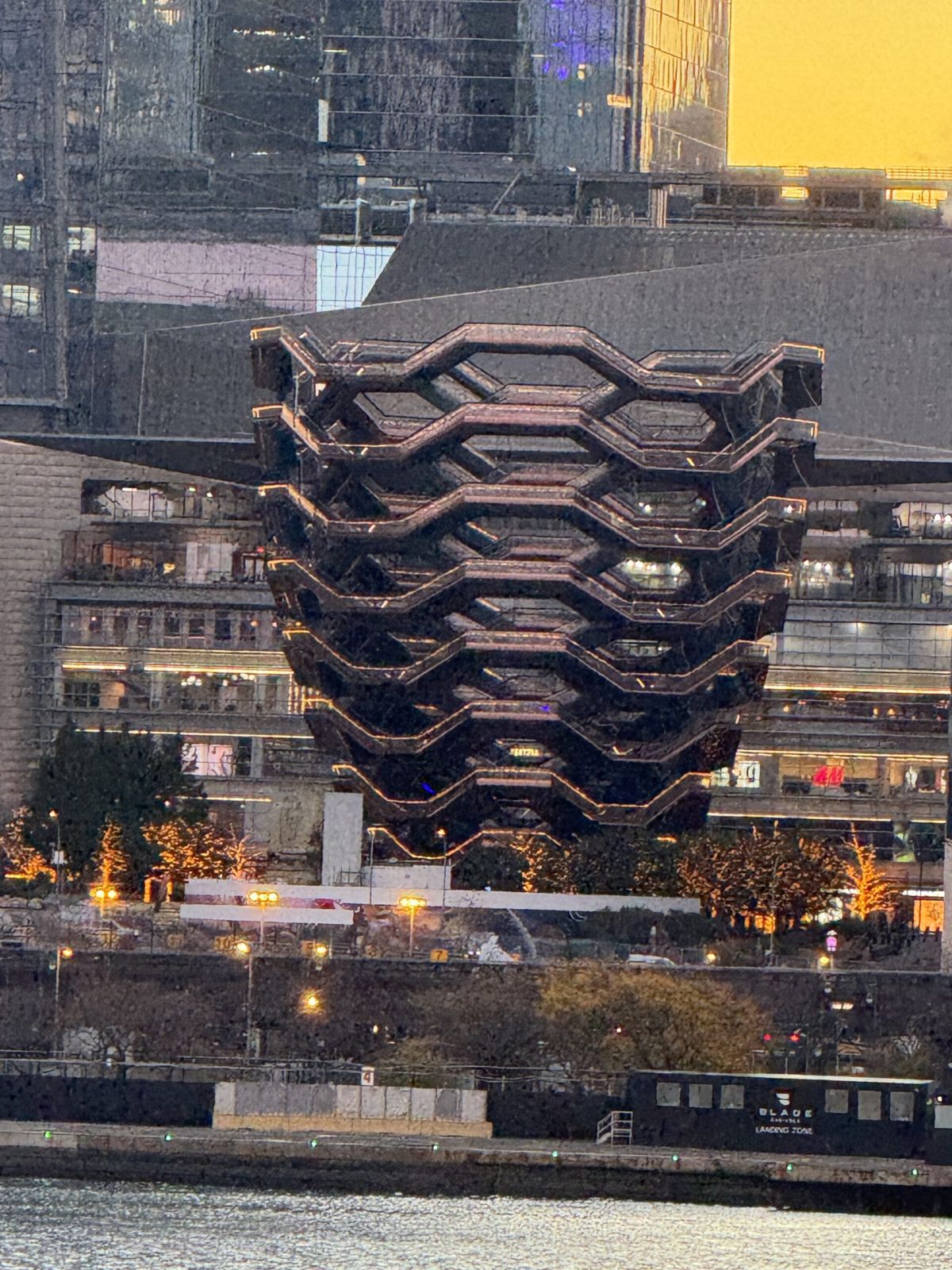 The vessel at Hudson yards. The Vessel, an intricate honeycomb-like structure in Hudson Yards, New York City, featuring a series of stacked platforms and interconnected staircases, inviting visitors to explore its unique design and enjoy panoramic views of the surrounding area.